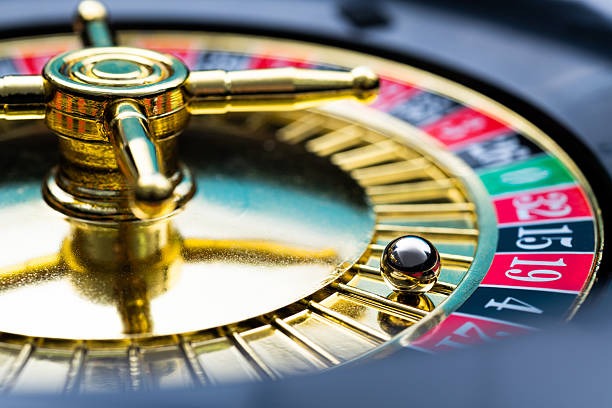Wild Coaster slot game interface showing five reels with symbol combinations and paytable
